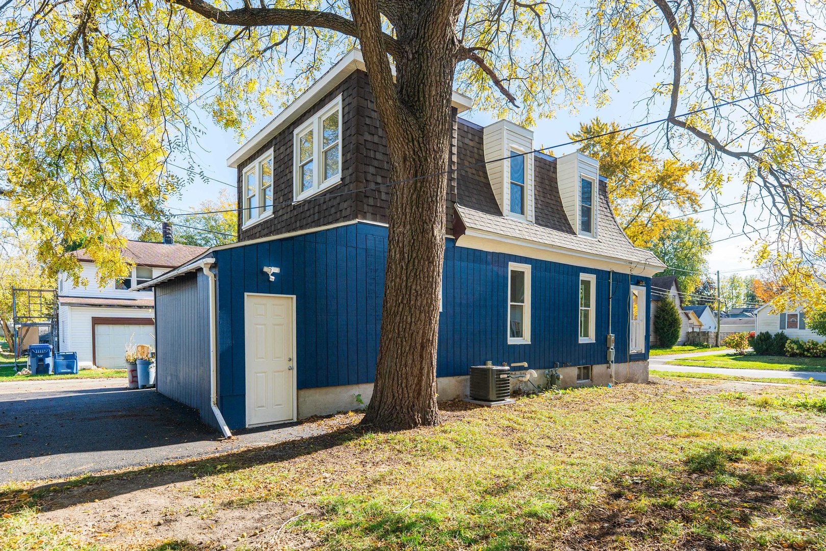 615 Prospect Street DeKalb, IL 60115 - Photo 25 of 27 a view of a house with snow on the road