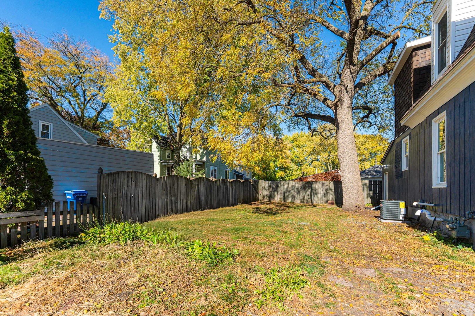 615 Prospect Street DeKalb, IL 60115 - Photo 26 of 27 a view of swimming pool with wooden fence