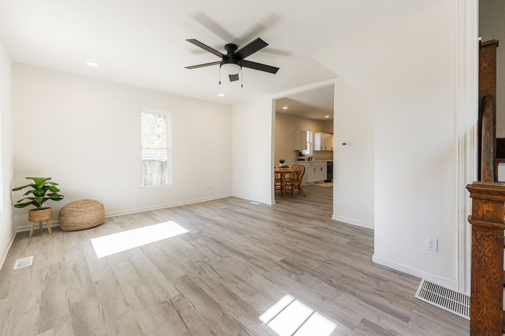 615 Prospect Street DeKalb, IL 60115 - Photo 5 of 27 a view of an empty room and wooden floor