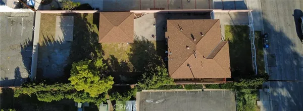 a view of a water with a table and chairs