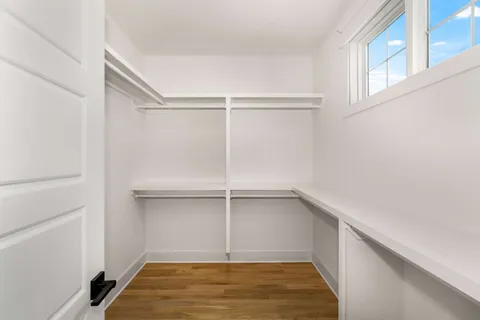 a view of an empty walk in closet