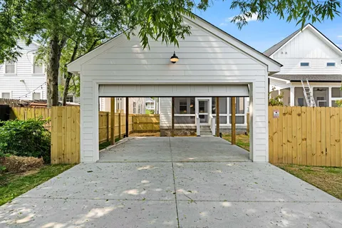 a house view with a backyard space
