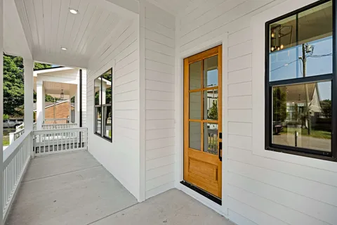 workspace with wooden floor and windows