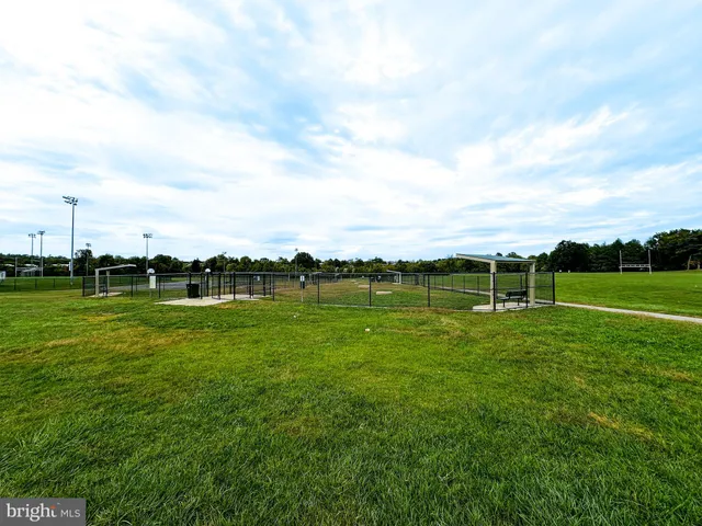 a view of a golf course with a lake