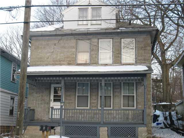 a view of front a house with large windows