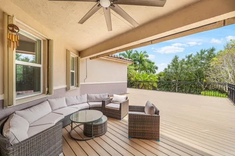 a view of a backyard with sitting area