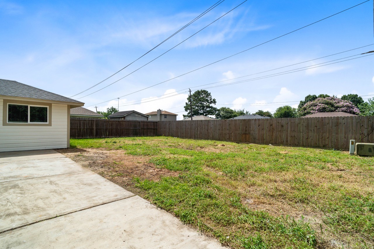 5326 Findlay Drive Pasadena, TX 77505 - Photo 46 of 50 Expansive, fully fenced backyard provides plenty of room for entertaining, gardening, pets, or future outdoor additions.