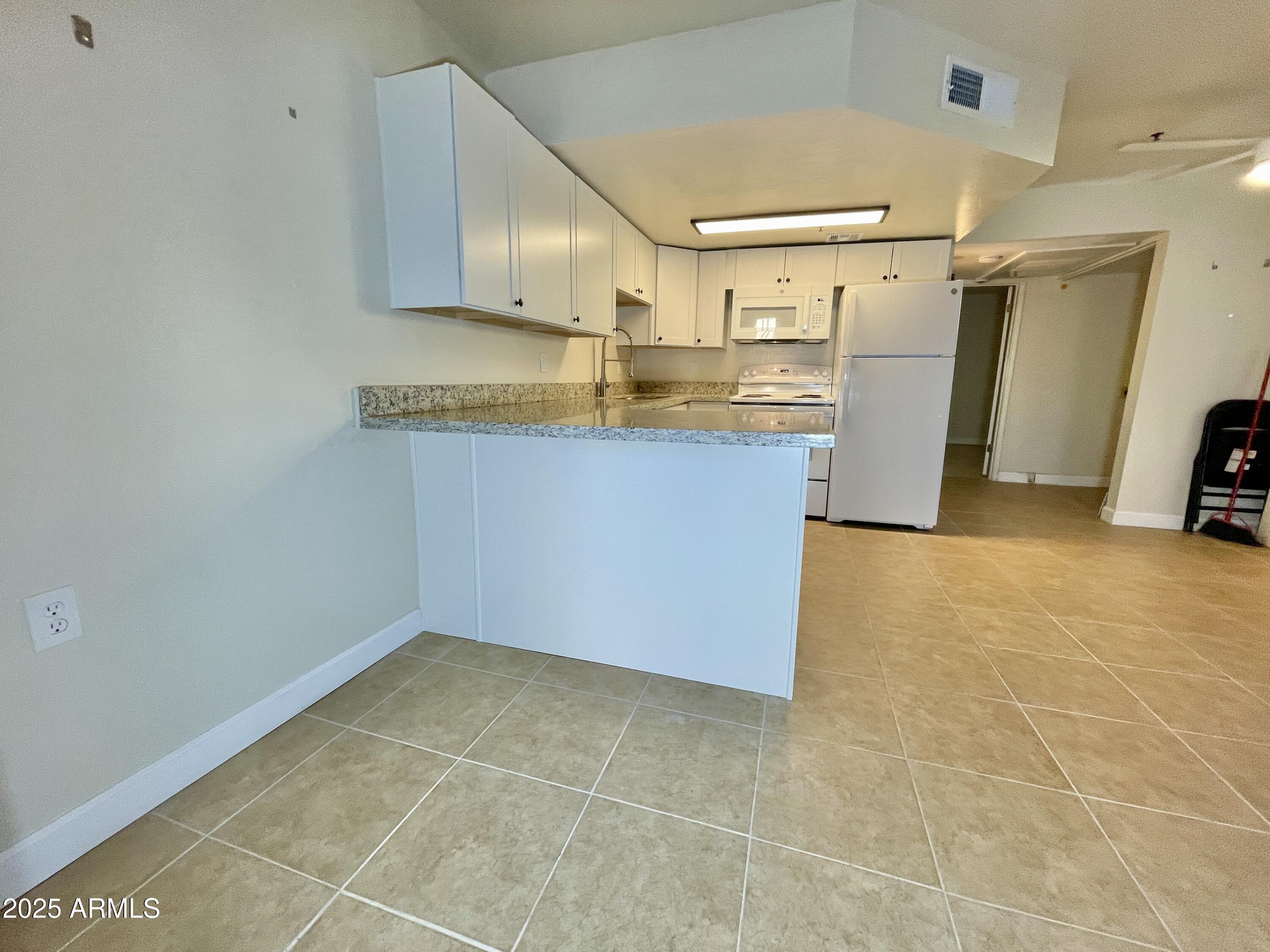 12221 West Bell Road, Unit 162 Surprise, AZ 85378 - Photo 15 of 36 Kitchen View 3