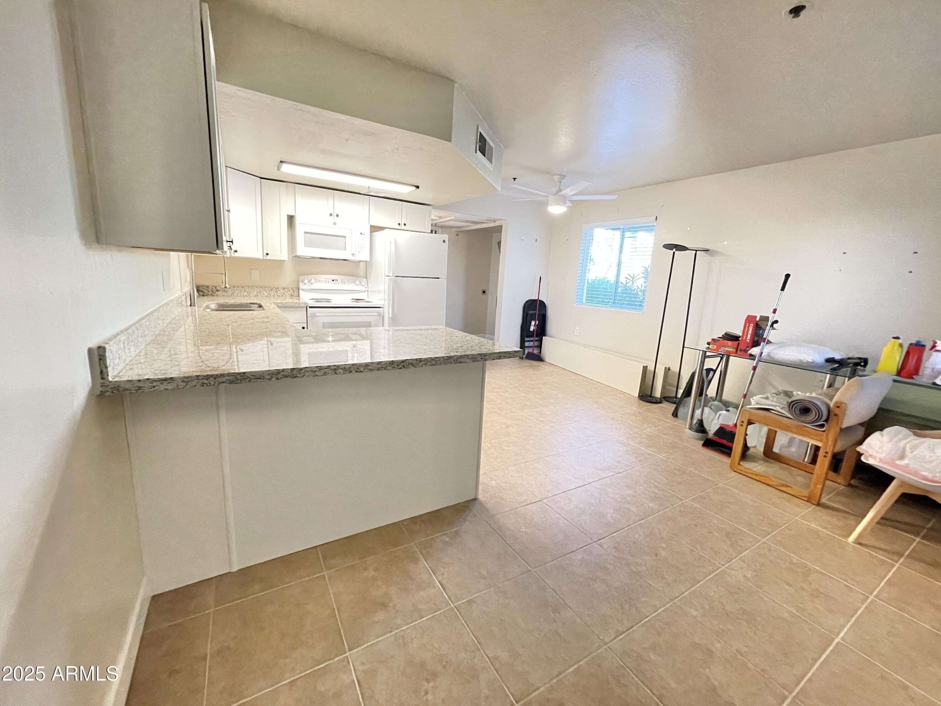 12221 West Bell Road, Unit 162 Surprise, AZ 85378 - Photo 16 of 36 Kitchen View 4