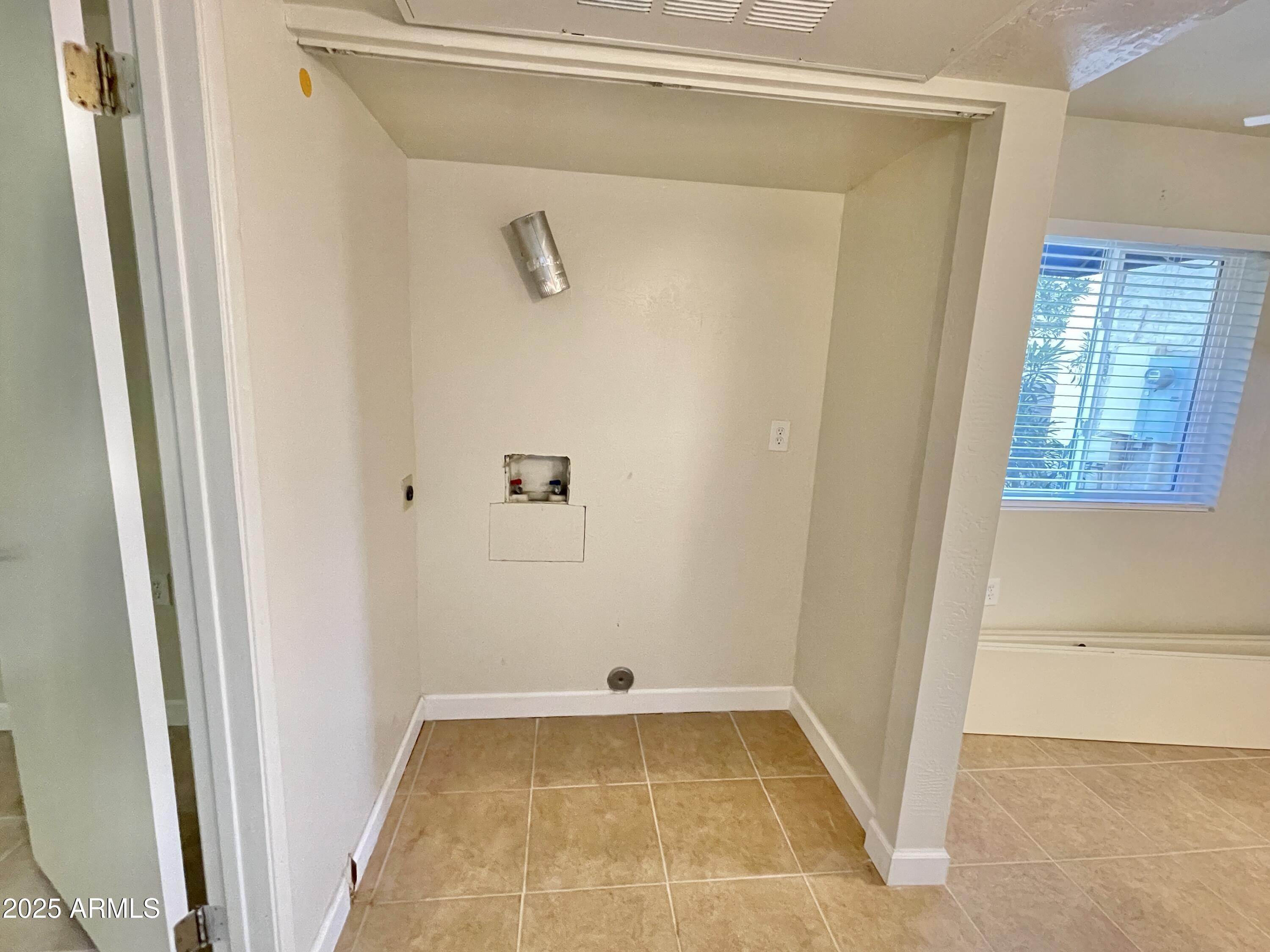 12221 West Bell Road, Unit 162 Surprise, AZ 85378 - Photo 33 of 36 Laundry Closet