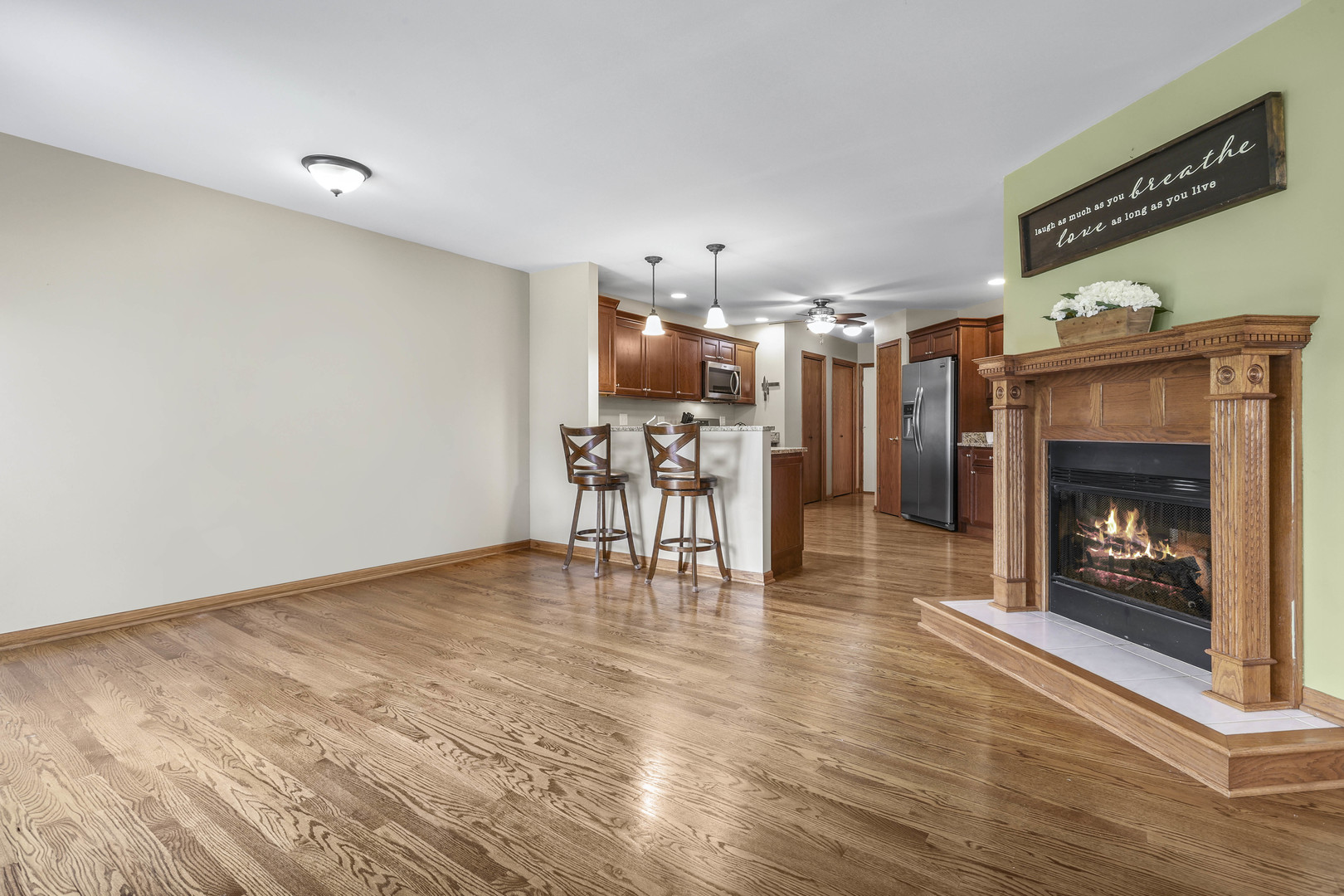 173 Harper Lane Lemont, IL 60439 - Photo 17 of 36 a view of a livingroom with a fireplace