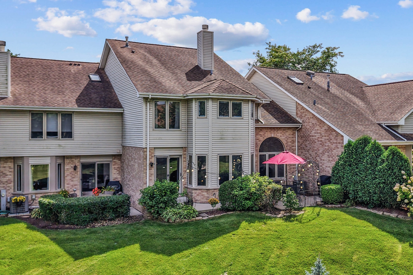 173 Harper Lane Lemont, IL 60439 - Photo 2 of 36 a front view of a house with a yard