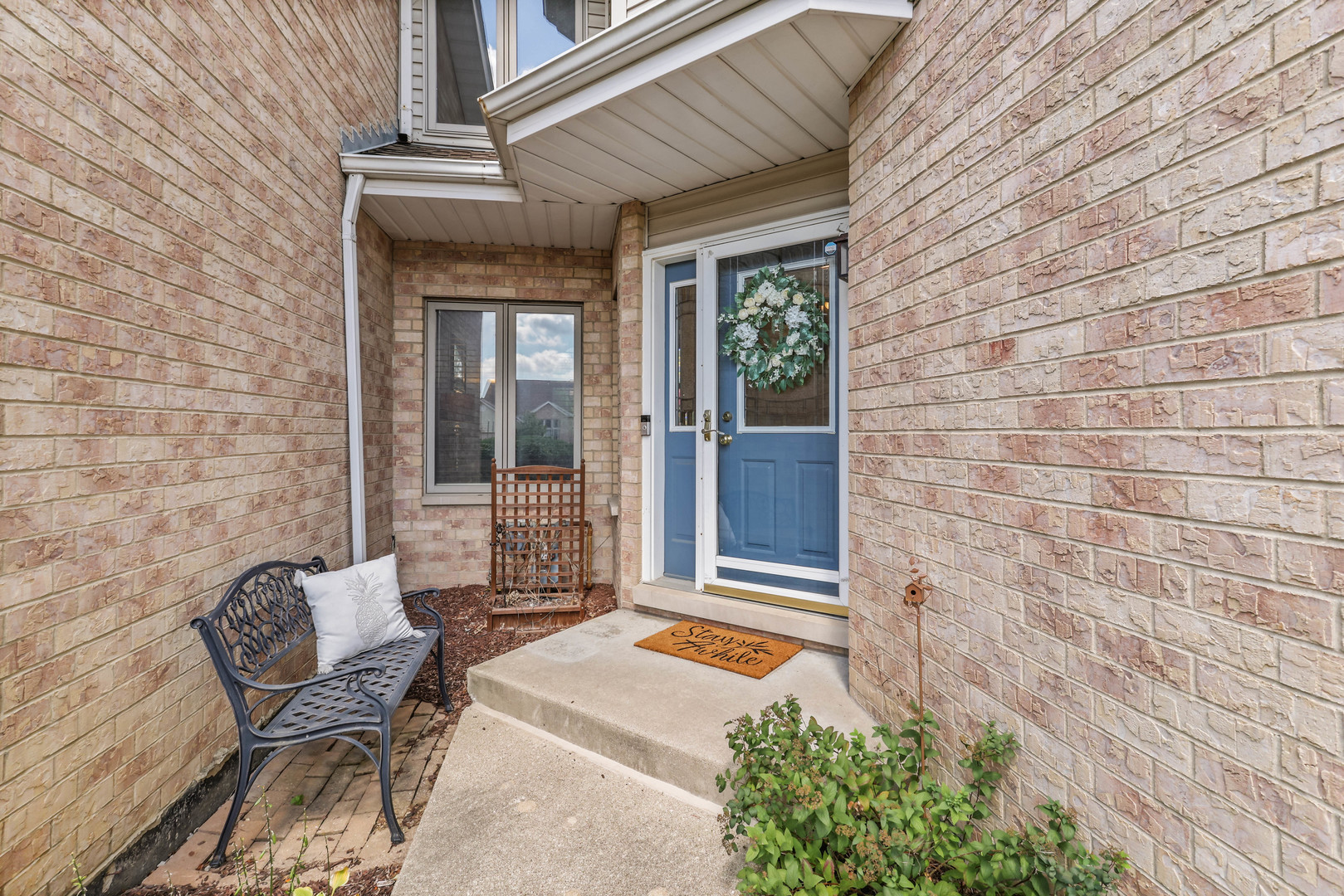 173 Harper Lane Lemont, IL 60439 - Photo 6 of 36 a view of a two chairs in the patio with a chair