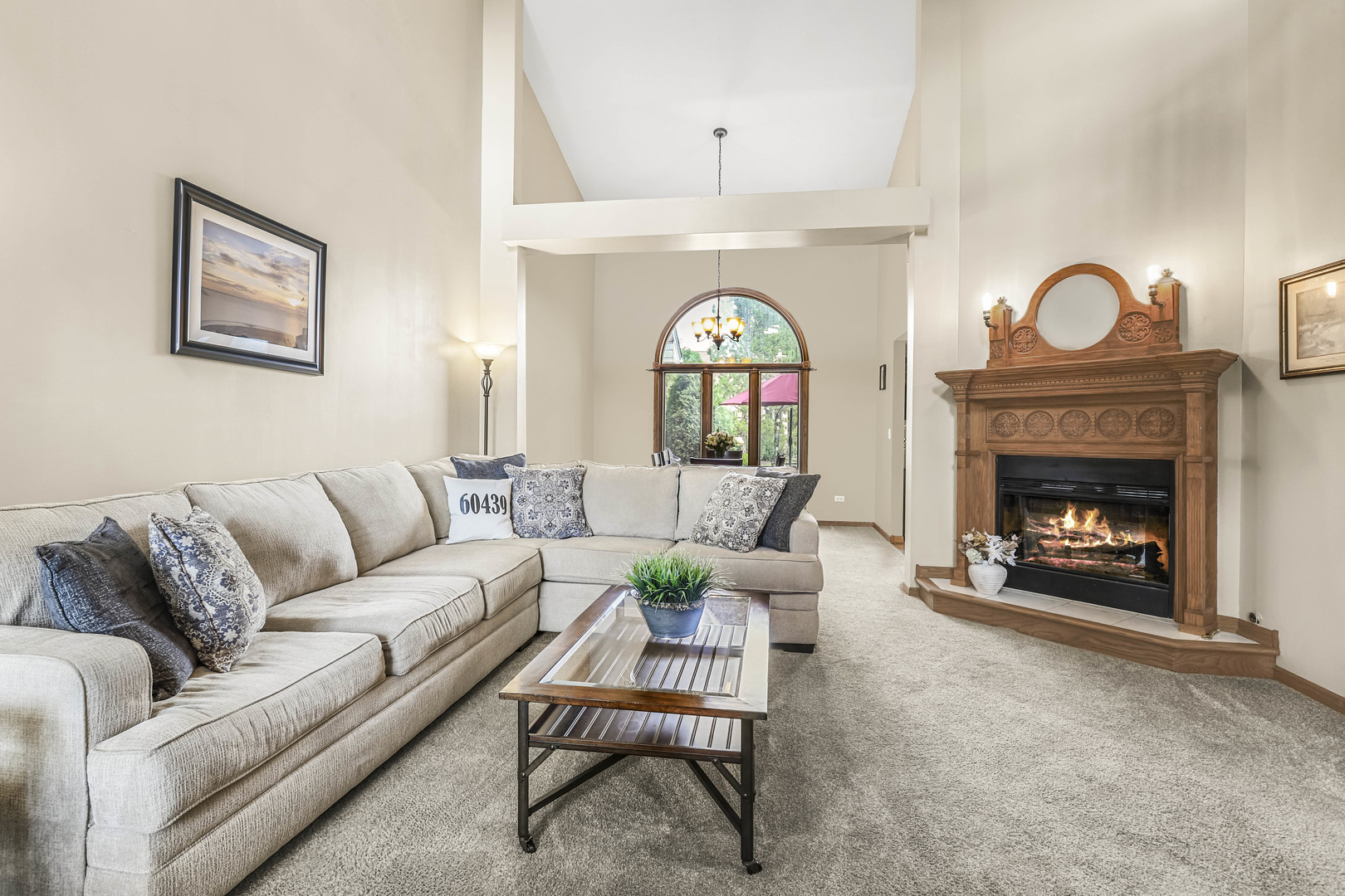 173 Harper Lane Lemont, IL 60439 - Photo 8 of 36 a living room with furniture and a fireplace