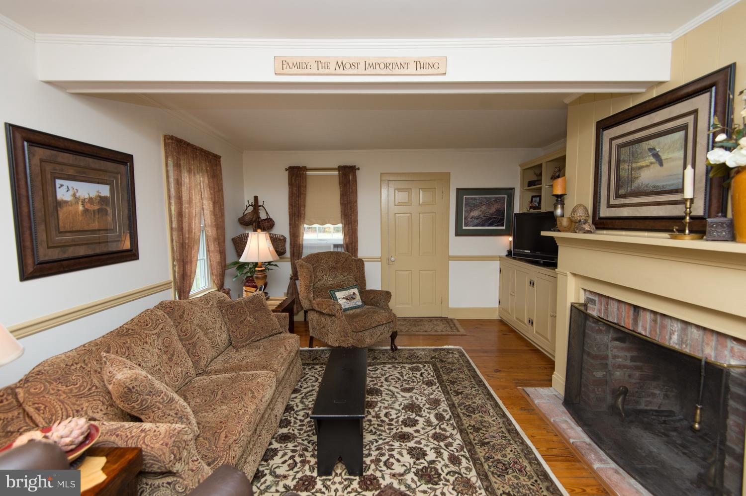 5525 Cassons Neck Road Cambridge, MD 21613 - Photo 10 of 30 Family Room w fireplace and gorgeous wood floors