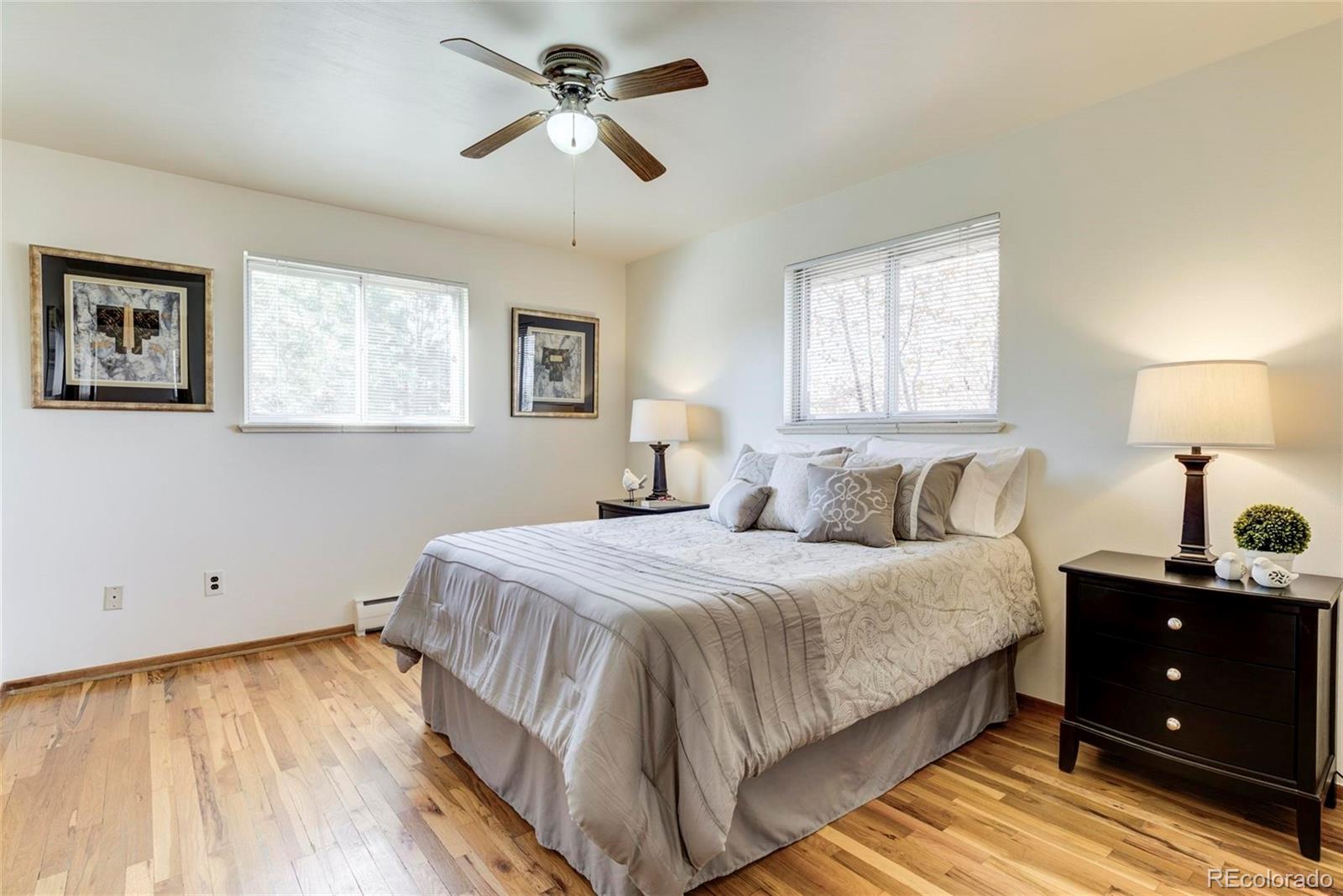 3170 Wright Street Wheat Ridge, CO 80215 - Photo 19 of 29 a bedroom with a bed and a window