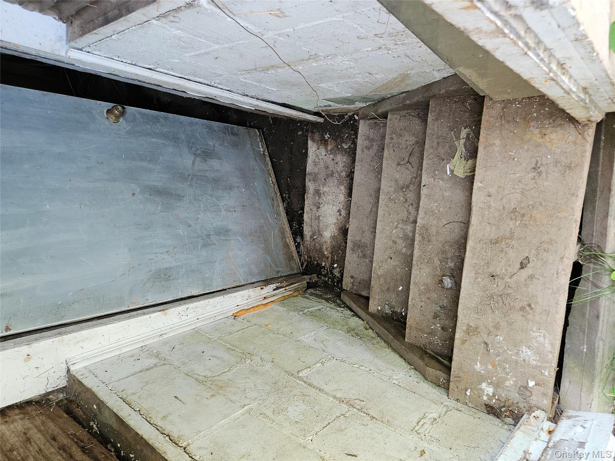 625 Briscoe Road Swan Lake, NY 12783 - Photo 13 of 19 Staircase featuring concrete block wall