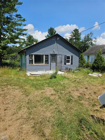 a house view with a garden space