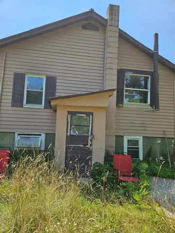 a front view of house with yard