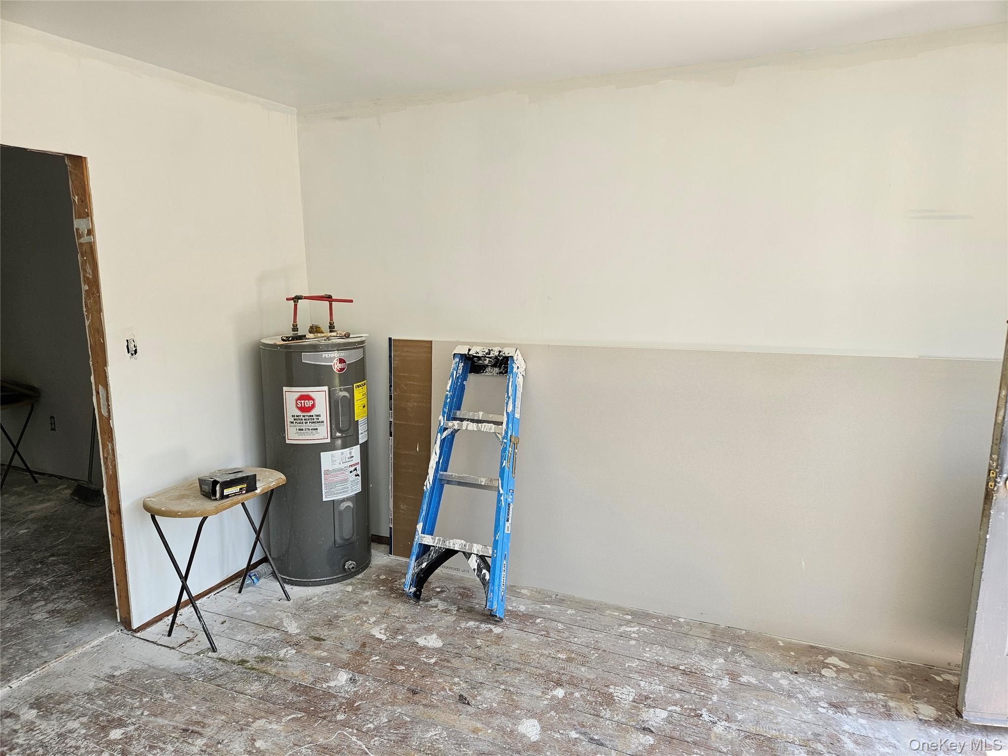 625 Briscoe Road Swan Lake, NY 12783 - Photo 4 of 19 some sheetrock in Living Room
