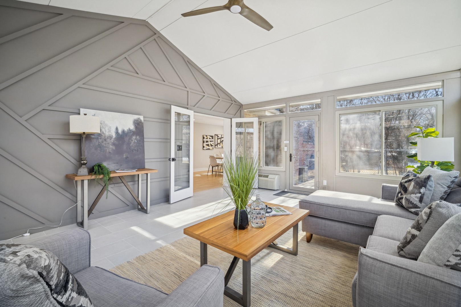 832 Sumac Road Highland Park, IL 60035 - Photo 12 of 20 a living room with furniture and a table