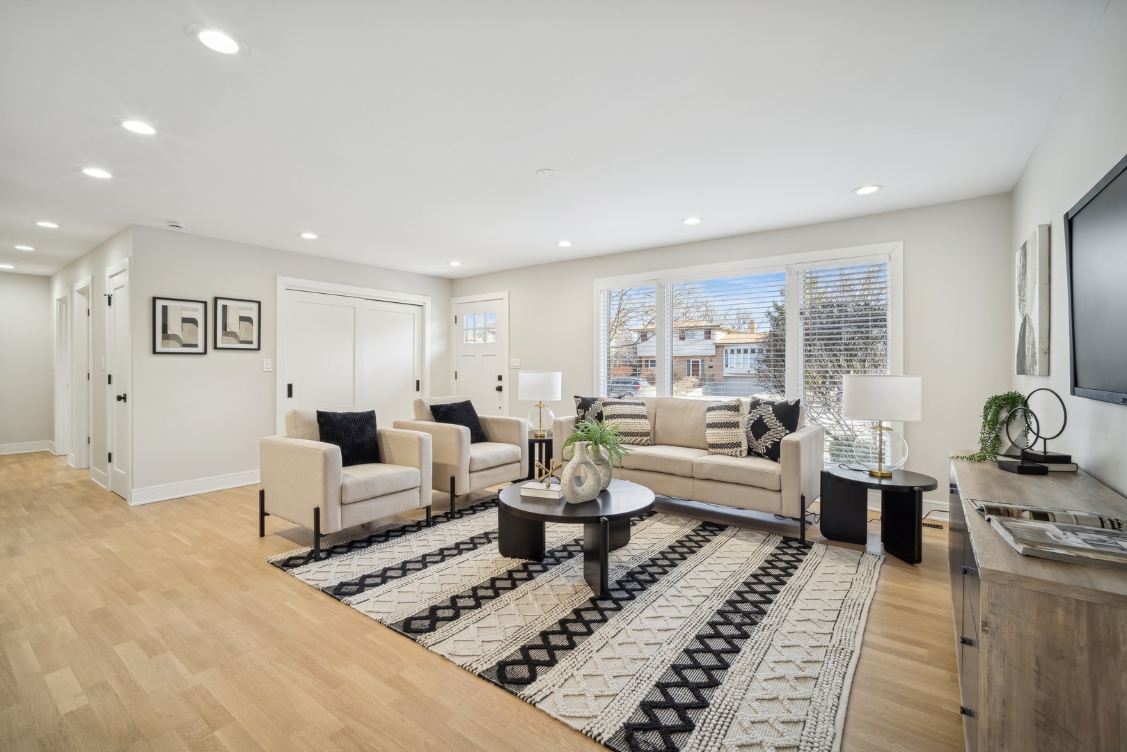 832 Sumac Road Highland Park, IL 60035 - Photo 4 of 20 a living room with furniture or couch and a coffee table