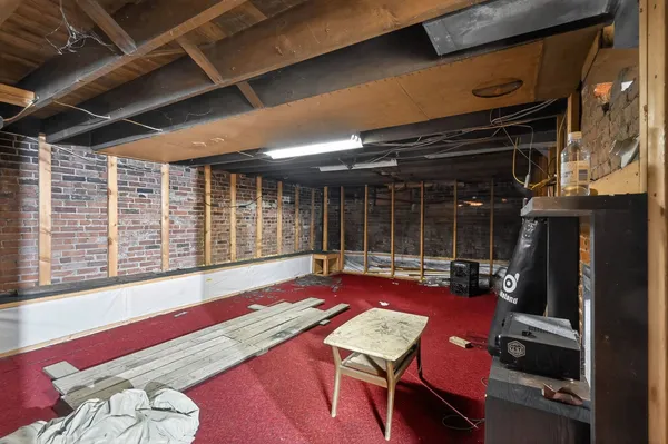 a view of a chairs and table in a patio