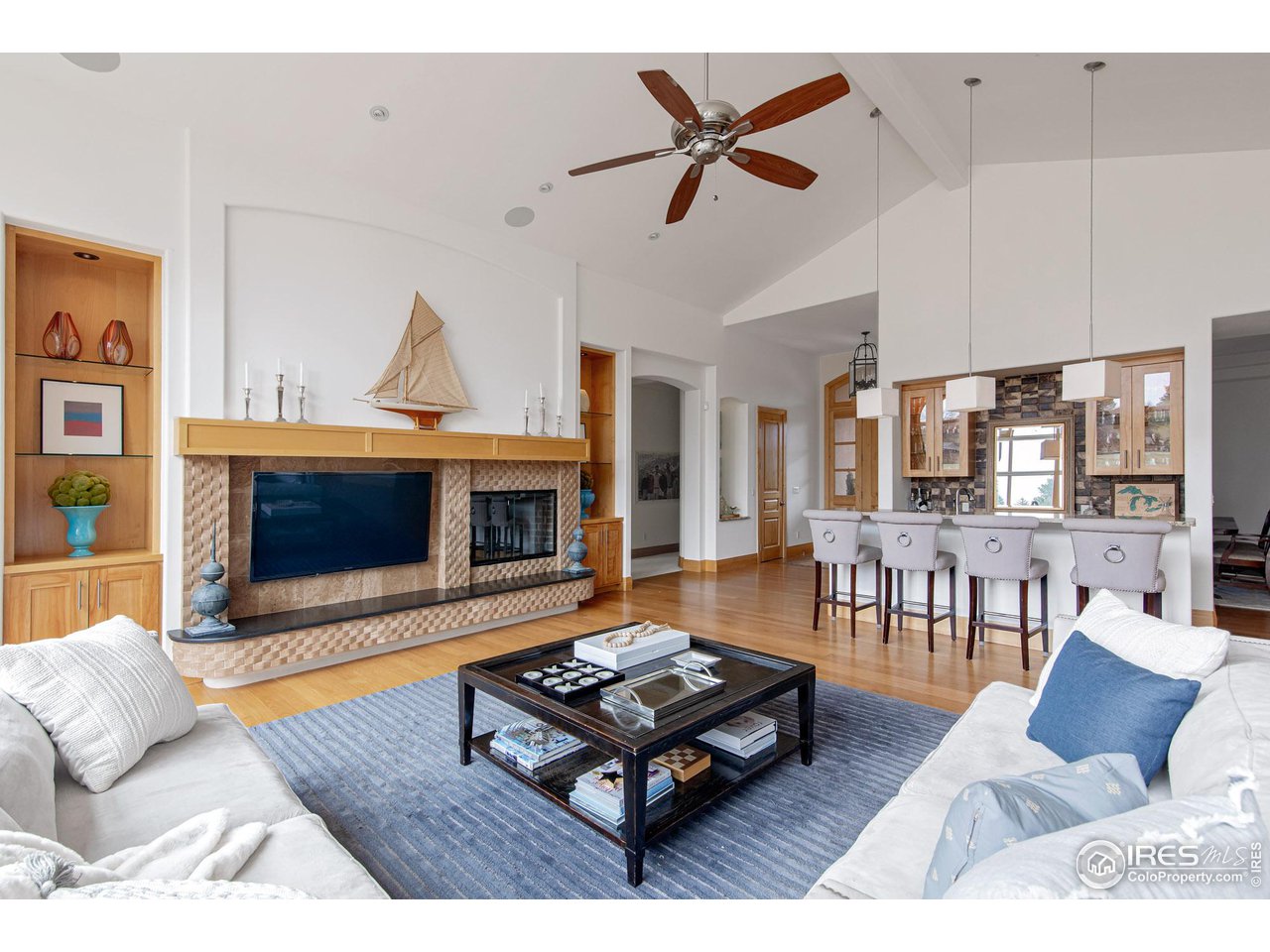 6922 Frying Pan Road Boulder, CO 80301 - Photo 10 of 39 a living room with furniture and a fireplace