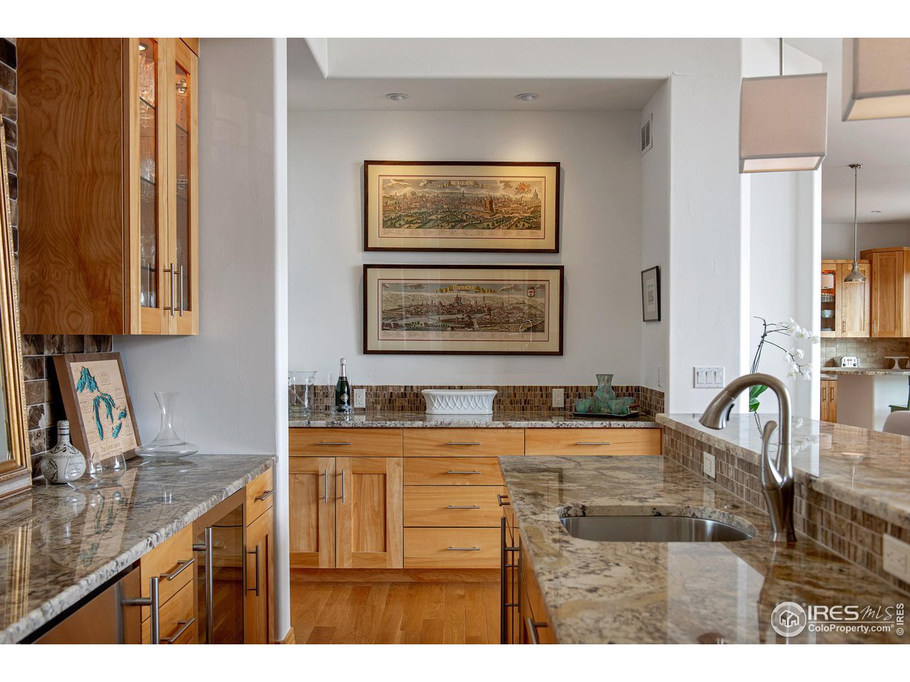6922 Frying Pan Road Boulder, CO 80301 - Photo 11 of 39 a bathroom with a granite countertop sink a mirror and a