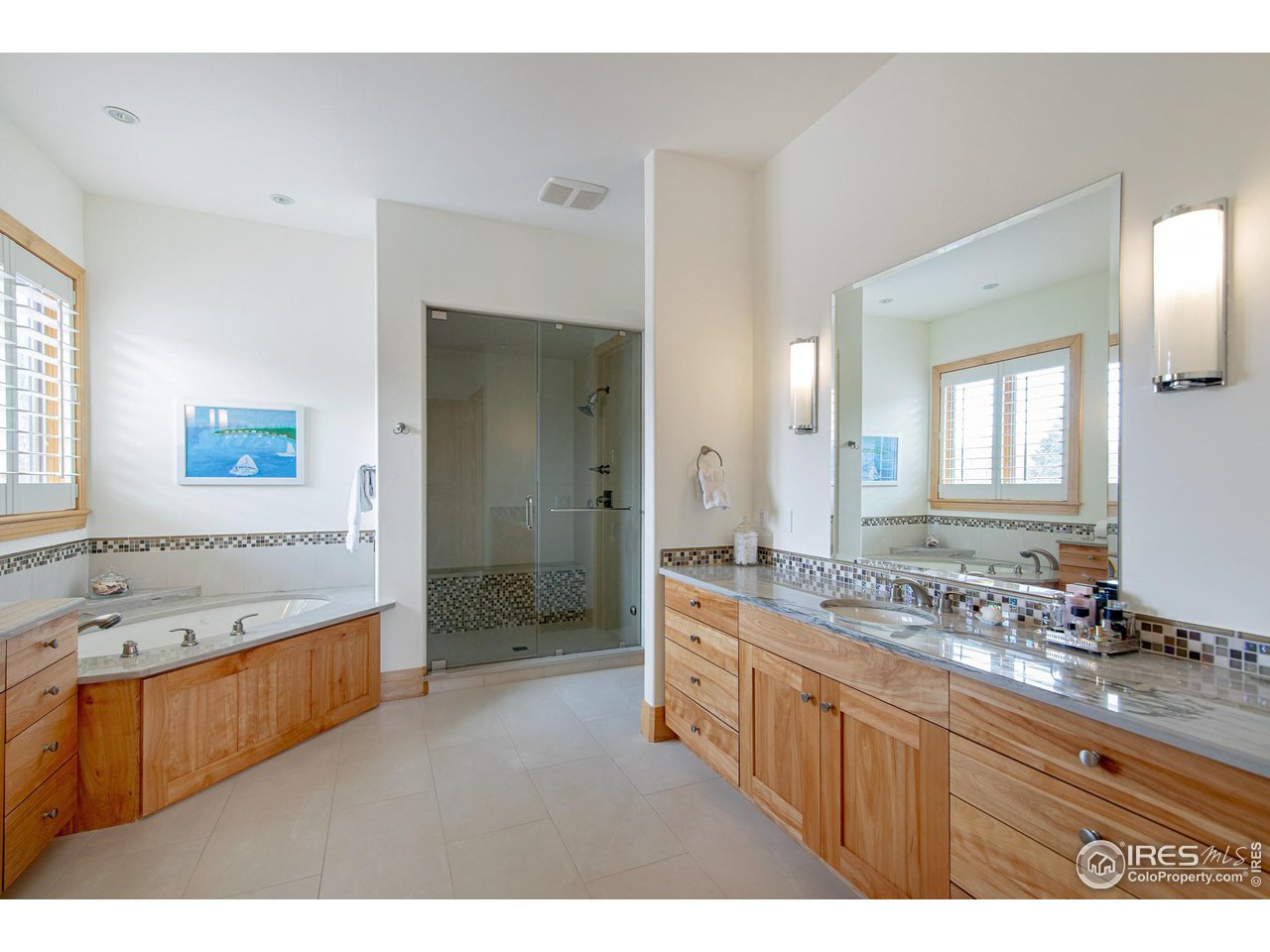 6922 Frying Pan Road Boulder, CO 80301 - Photo 15 of 39 a bathroom with a granite countertop tub sink shower and mirror