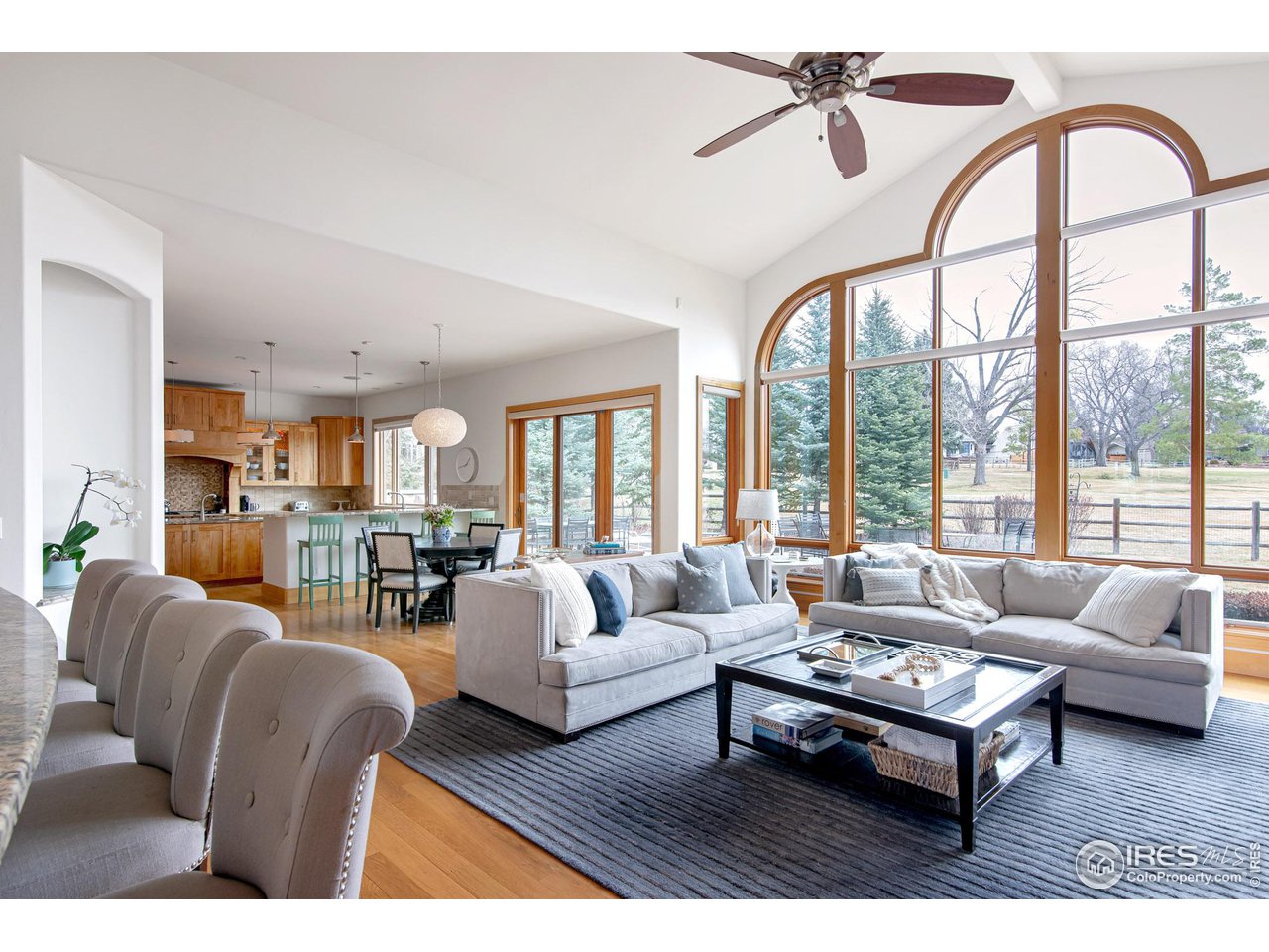6922 Frying Pan Road Boulder, CO 80301 - Photo 16 of 39 a living room with furniture or outdoor view and a large window