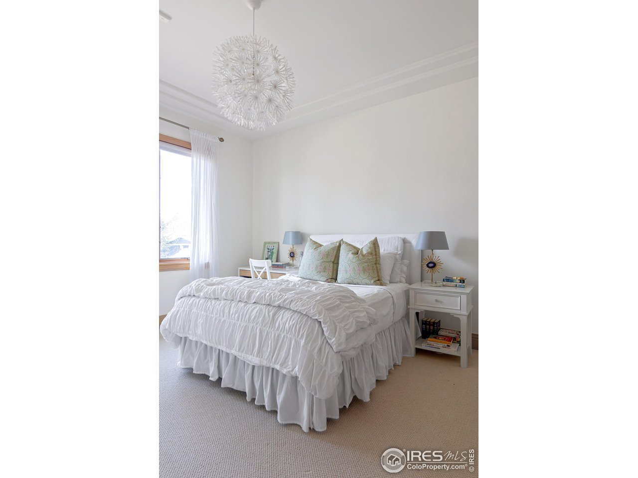 6922 Frying Pan Road Boulder, CO 80301 - Photo 26 of 39 a bed room with a bed and a window