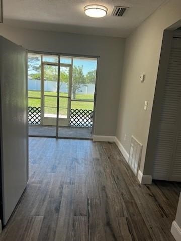 Undisclosed Address Sebastian, FL 32958 - Photo 4 of 14 wooden floor in an empty room with a window