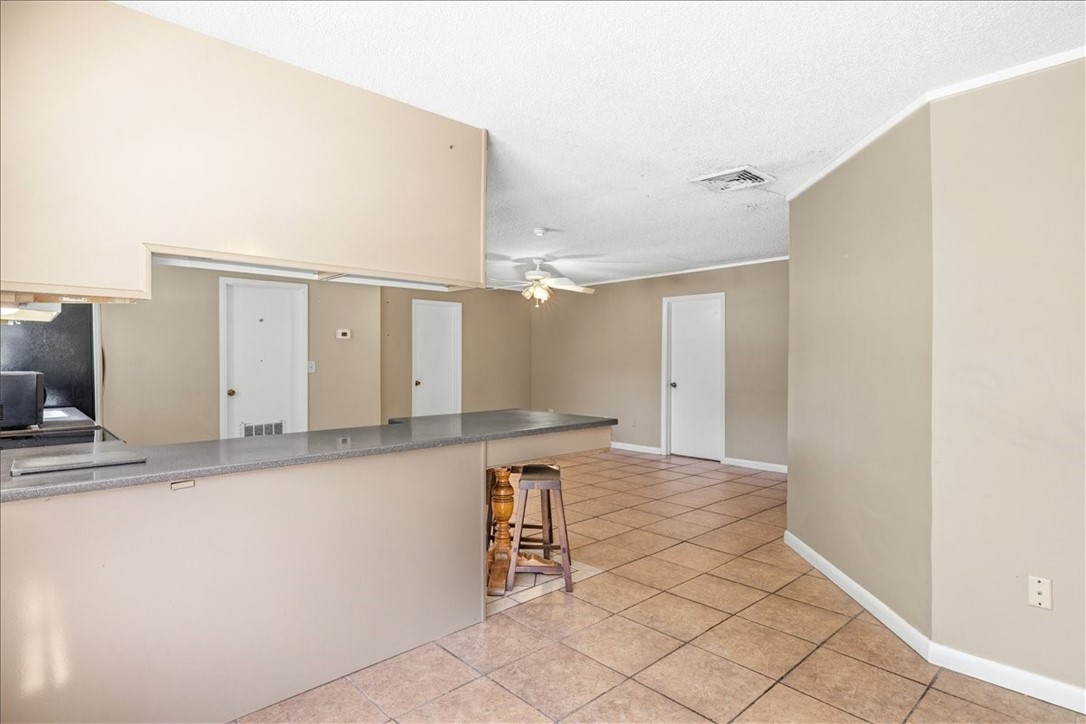 221 Balboa Street, Unit A Fort Pierce, FL 34949 - Photo 21 of 36 a view of a kitchen with a sink