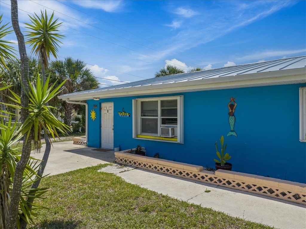 221 Balboa Street, Unit A Fort Pierce, FL 34949 - Photo 29 of 36 a front view of a house with a yard
