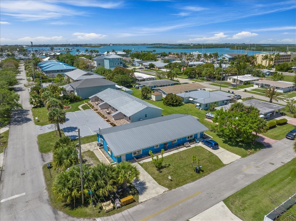 221 Balboa Street, Unit A Fort Pierce, FL 34949 - Photo 32 of 36 an aerial view of residential houses with outdoor space and street view