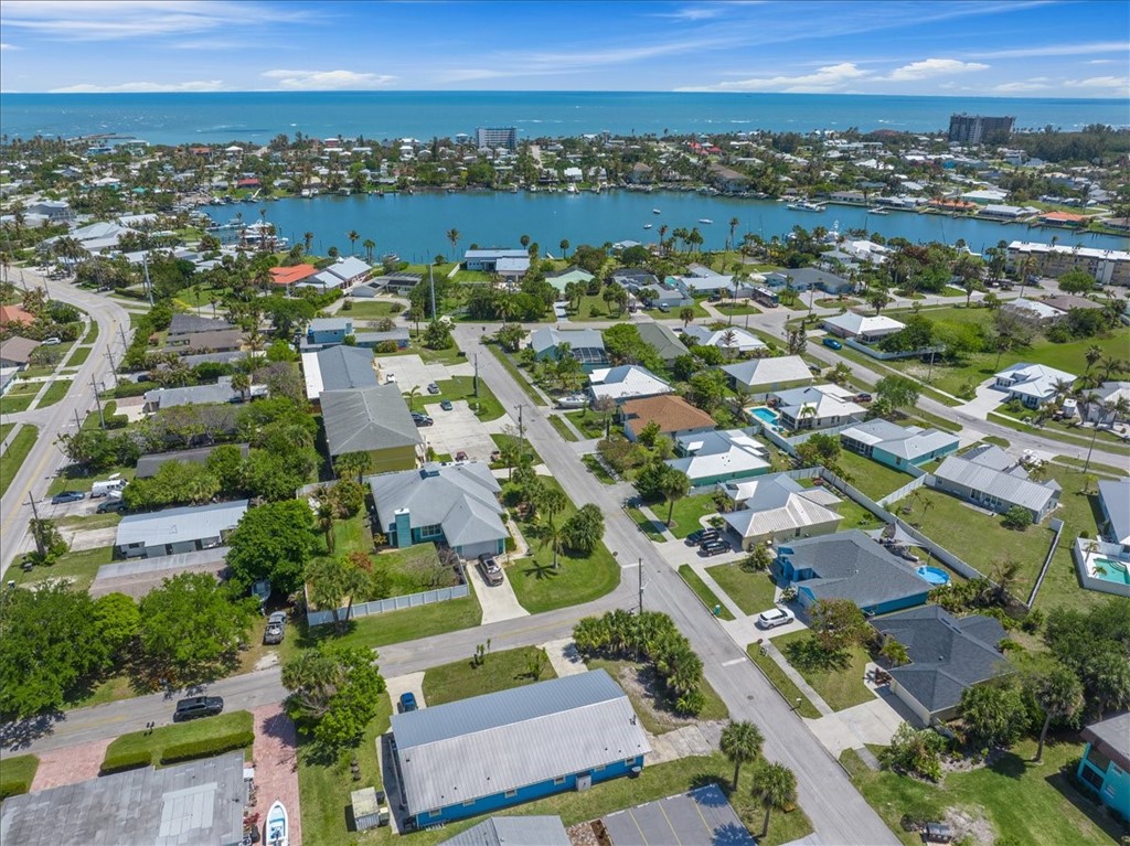 221 Balboa Street, Unit A Fort Pierce, FL 34949 - Photo 35 of 36 an aerial view of residential houses with outdoor space