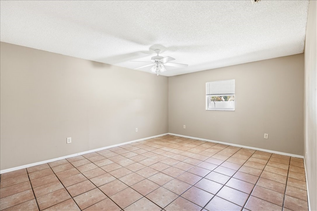 221 Balboa Street, Unit A Fort Pierce, FL 34949 - Photo 8 of 36 a view of an empty room and window