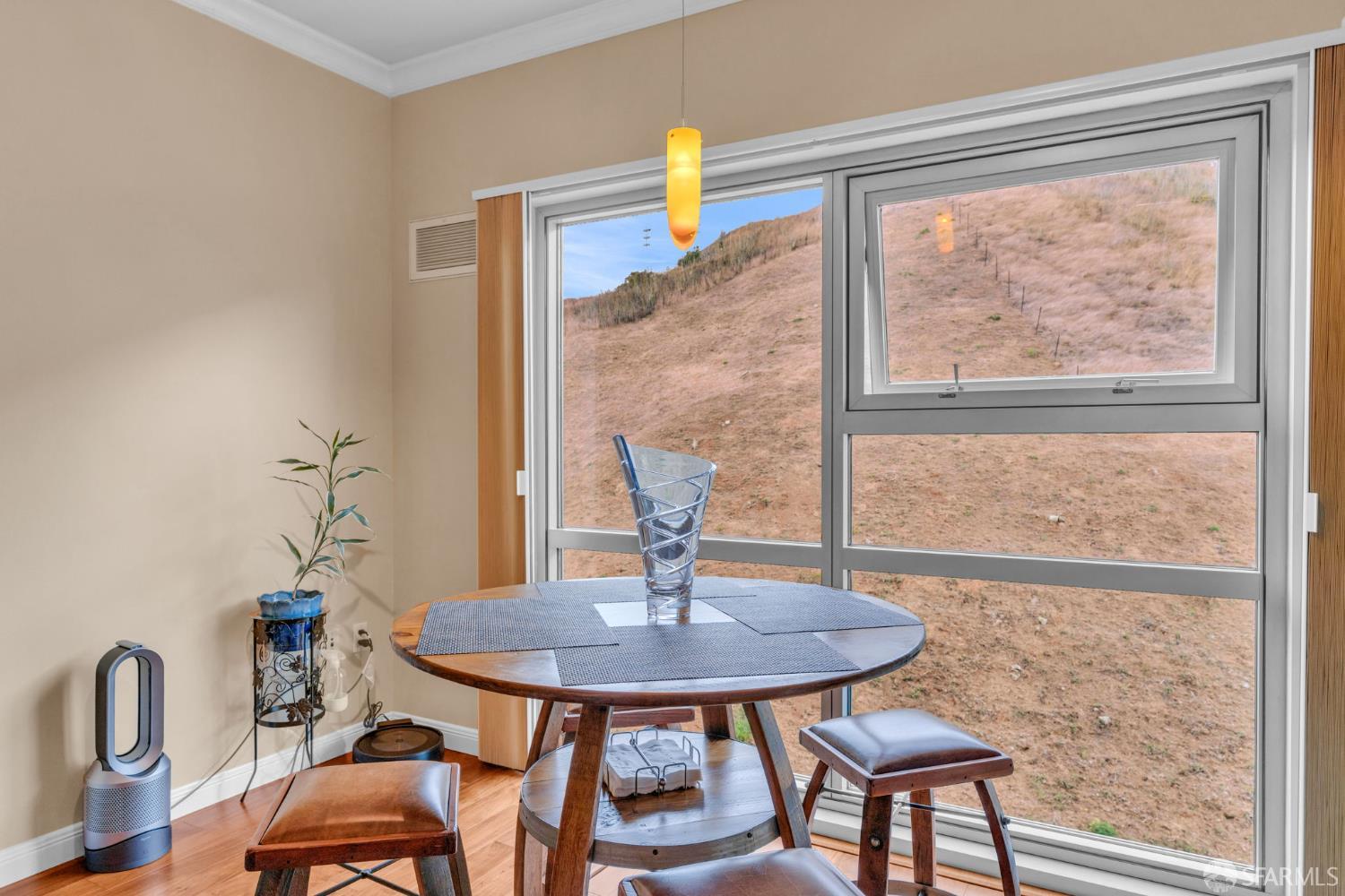 1 Mandalay Place, Unit 908 South San Francisco, CA 94080 - Photo 11 of 40 a view of a dining room with furniture window and outside view