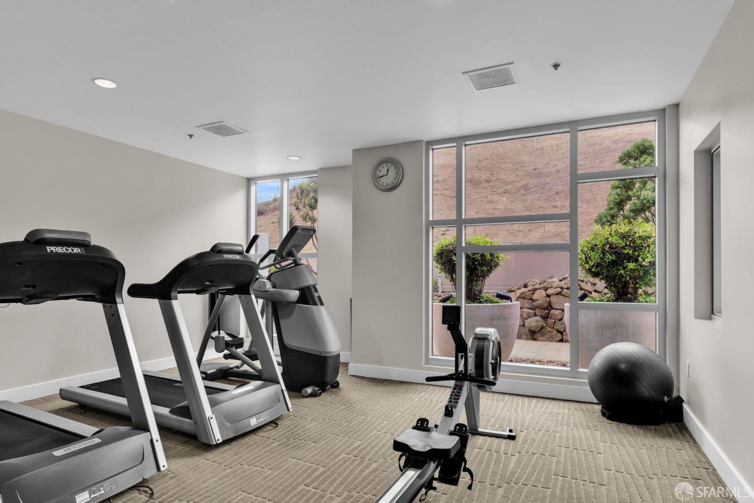 1 Mandalay Place, Unit 908 South San Francisco, CA 94080 - Photo 26 of 40 a view of a livingroom with furniture and windows