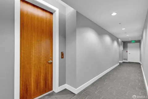 a view of hallway with a large window