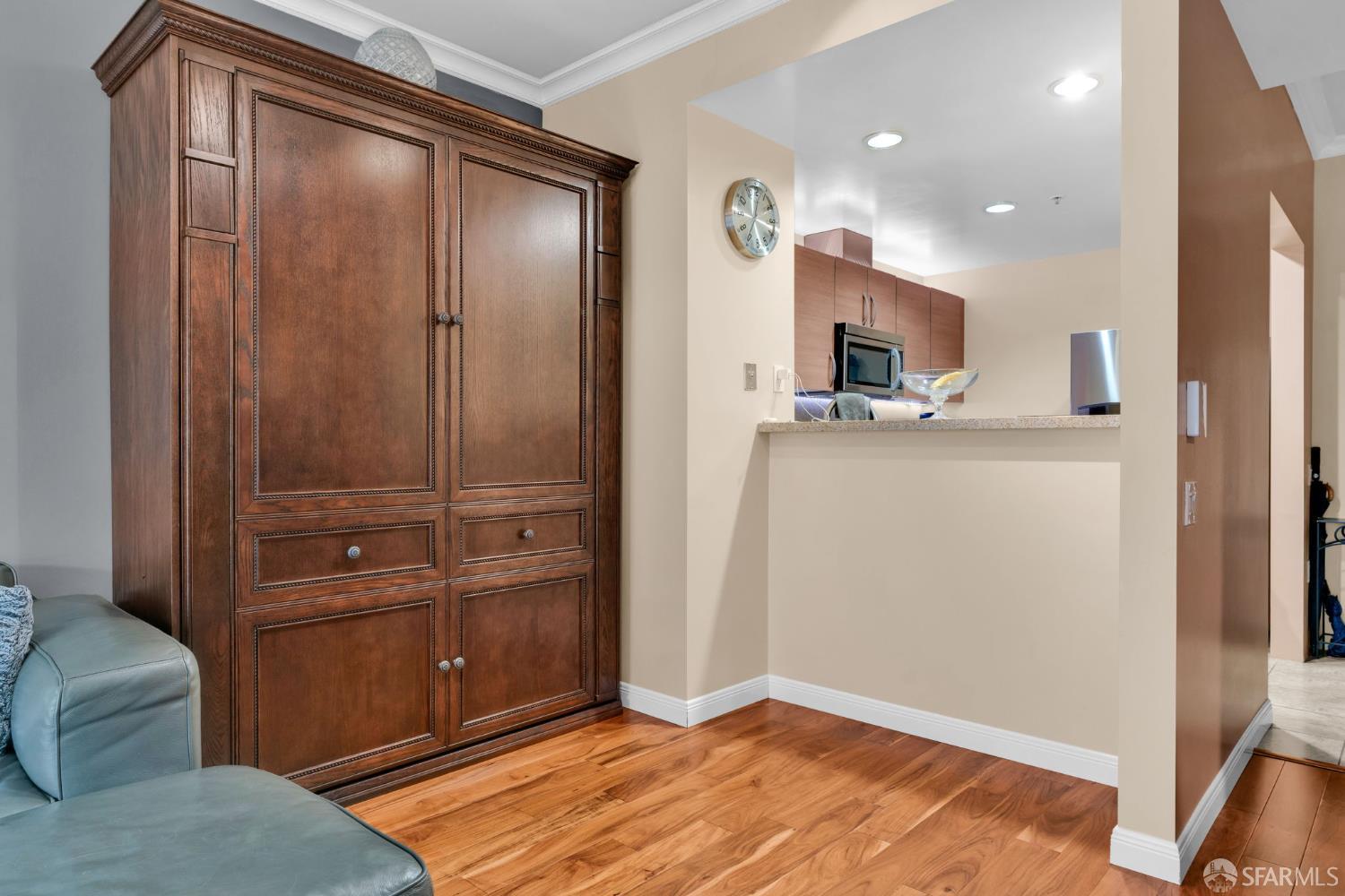 1 Mandalay Place, Unit 908 South San Francisco, CA 94080 - Photo 8 of 40 a view of a kitchen from the hallway
