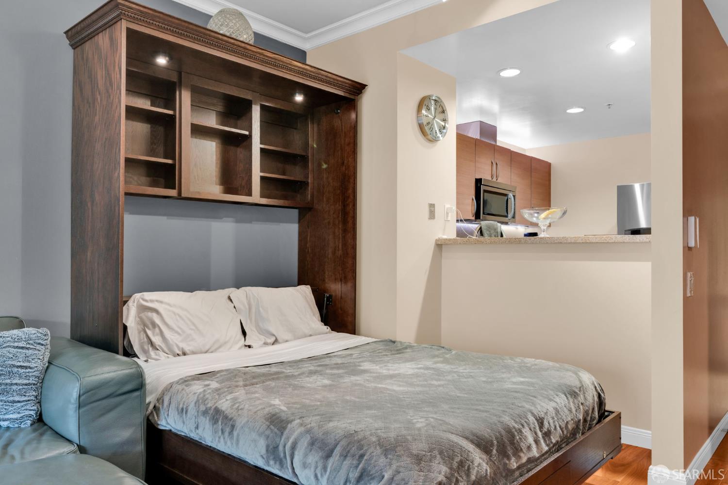 1 Mandalay Place, Unit 908 South San Francisco, CA 94080 - Photo 10 of 40 a bedroom with a bed and a television