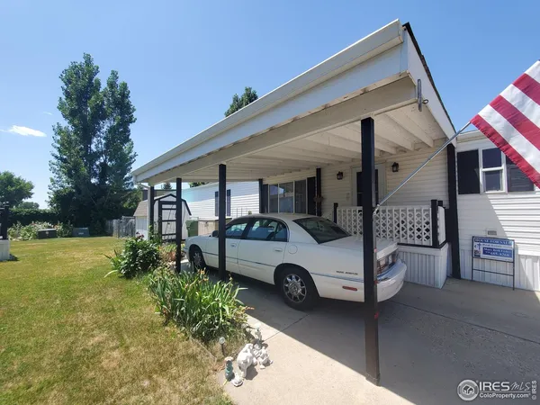 a car parked in front of a house