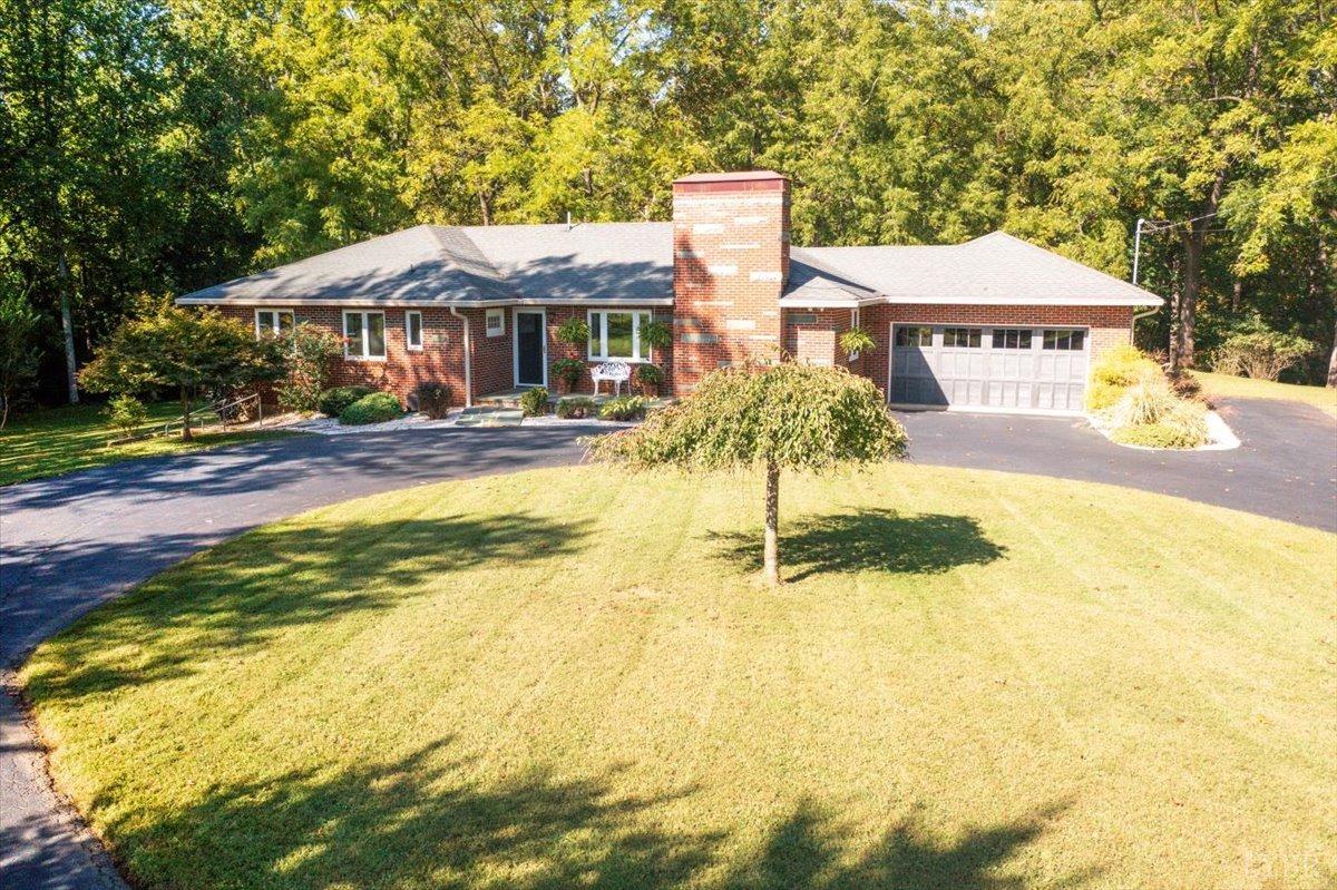a front view of a house with swimming pool