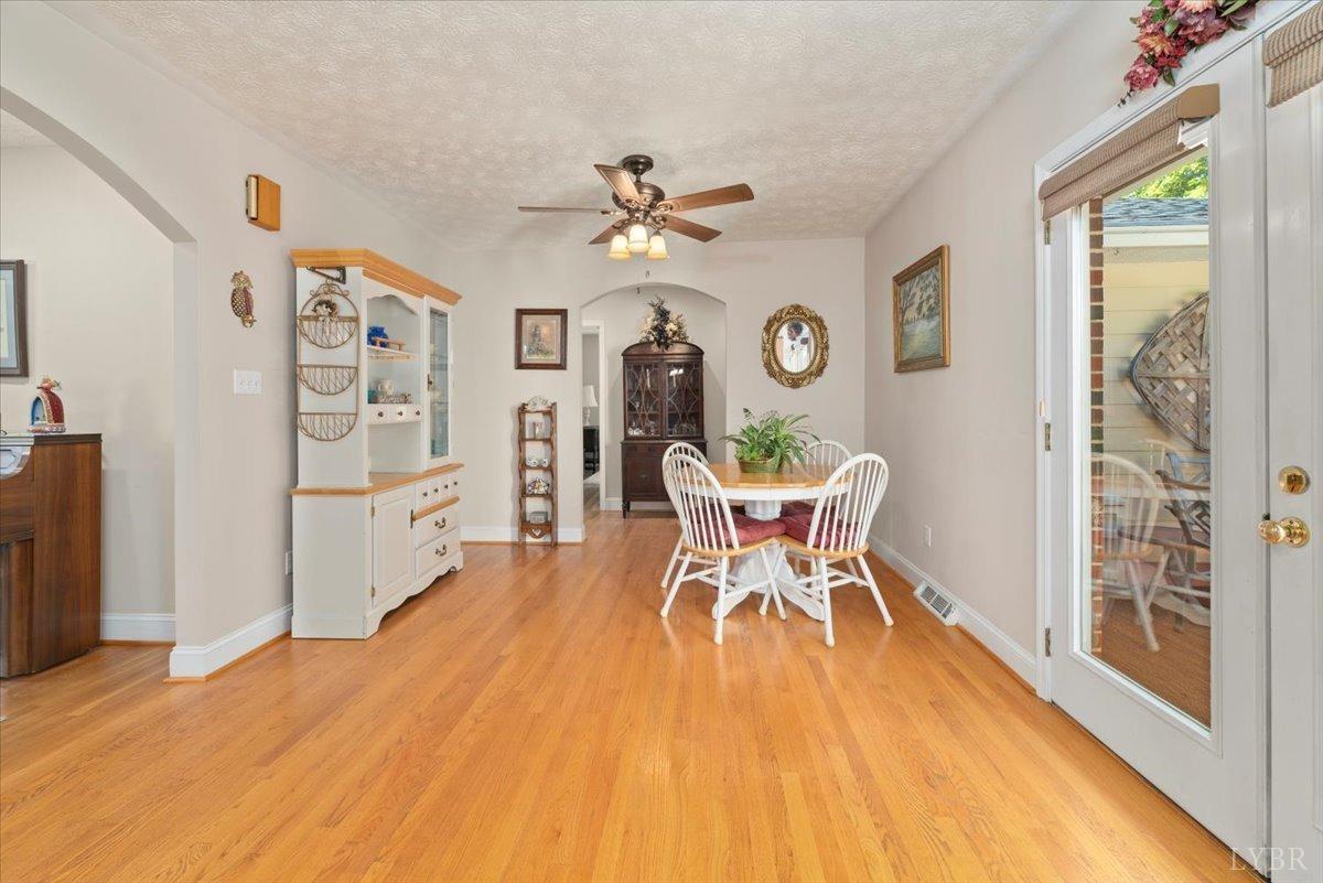 159 Blue Ridge Lane Amherst, VA 24521 - Photo 16 of 71 a view of a dining room with furniture window and wooden floor