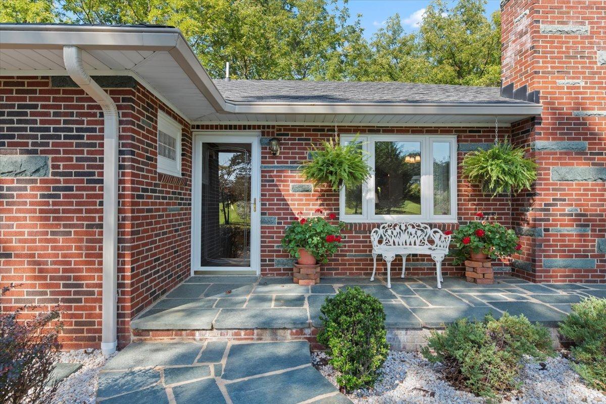 159 Blue Ridge Lane Amherst, VA 24521 - Photo 2 of 71 a backyard of a house with outdoor seating