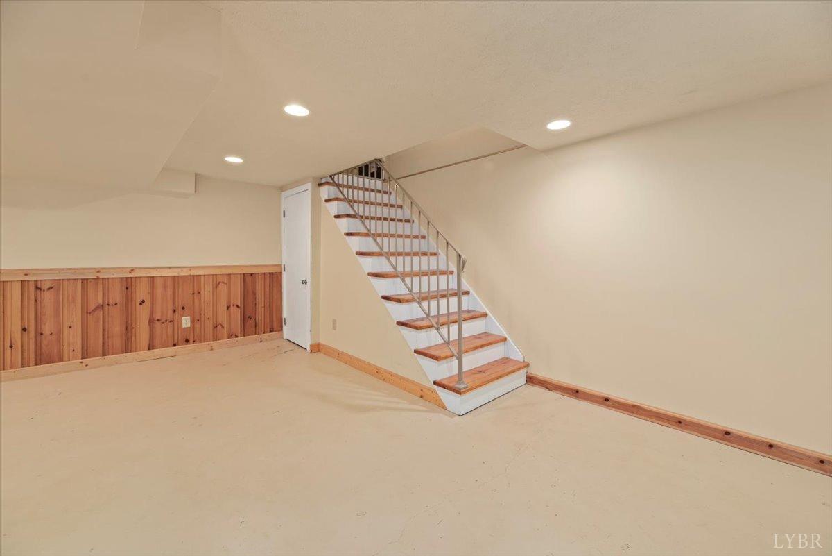 159 Blue Ridge Lane Amherst, VA 24521 - Photo 38 of 71 a view of an empty room with stairs