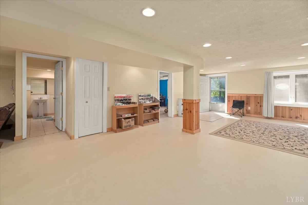 159 Blue Ridge Lane Amherst, VA 24521 - Photo 39 of 71 a view of a livingroom with furniture and a flat screen tv