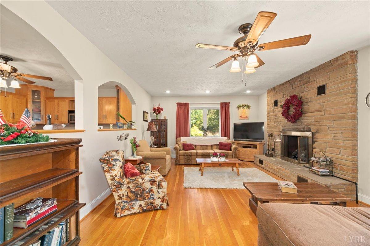159 Blue Ridge Lane Amherst, VA 24521 - Photo 4 of 71 a living room with fireplace furniture and a flat screen tv